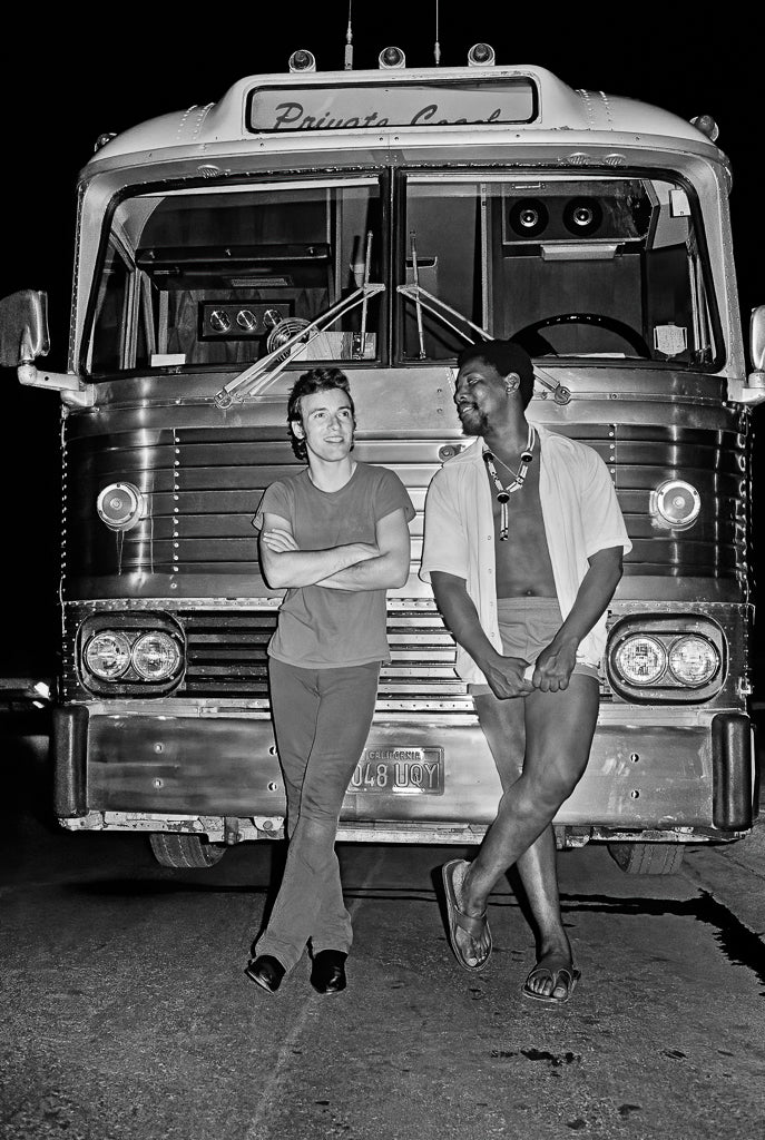 Bruce Springsteen and Clarence Clemons in front of Tour Bus, 1978