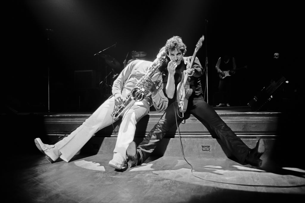Bruce Springsteen and Clarence Clemons Sitting on Stage Performing, 1978