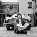 Mick Jagger with his Aston Martin DB6, 1966