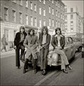 Led Zeppelin leaning on car, London, 1968