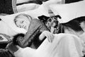 Brigitte Bardot with dog, on set of Les Novices